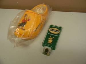 lot 90 image: NOS - HEINENKEN BEER WOODEN SHOE & TAP HANDLE - SEE PICTURES