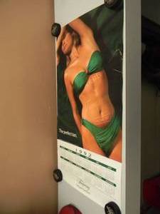 lot 93 image: TANGUERAY POSTER CALENDAR WITH GIRL - SEE PICTURES