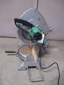 lot 1 image: Hitachi Milter Saw