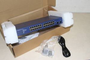 lot 48 image: Netgear GS724T Smart Pro Safe ProSafe Gigabit Computer Network Switch