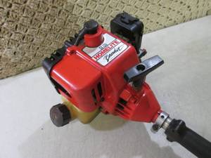 lot 55 image: Homelite Bandit SX-135 Weed Trimmer...