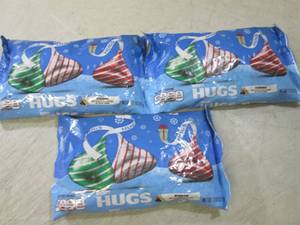 lot 210 image: 3 Bags of Hersheys Hugs Best by Aug...