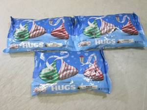 lot 212 image: 3 Bags of Hersheys Hugs Best by Aug...