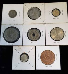 GROUP OF 8 FOREIGN COINS AS PICTURED - SOME SILVER