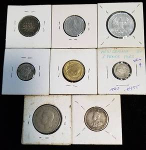 GROUP OF 8 FOREIGN COINS AS PICTURED - SOME SILVER