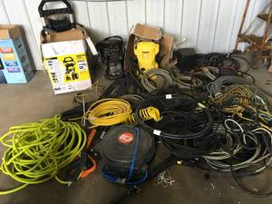 Pallet with assorted Used Shop Hoses and Preassure washers Customer returns