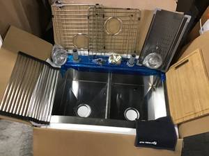 lot 10 image: All-in-One Apron-Front Farmhouse Stainless Steel 33 in. 5050 Double Bowl Workstation Sink with Accessory Kit by Glacier Bay NOT USED