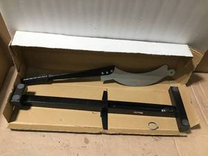 lot 60 image: Brutus 12 in. Flooring Cutter for Laminate and Vinyl Floors &nbspin good condition 