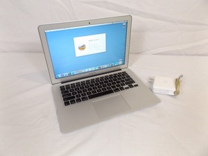 lot 74 image: Apple 13 MacBook Air and Charger