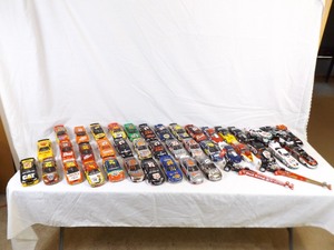 lot 103 image: 42 NASCAR, NHRA etc. 124 ect. Die Cast Cars with Boxes 