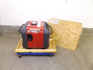 lot 132 image: Honda Generator Model #EU3000is in Custom Built Rolling Case