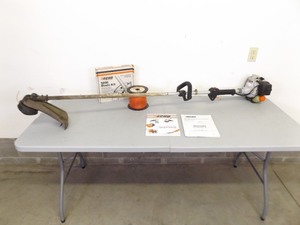 lot 139 image: Echo Weed Whip With Accessories Model SRM 2400