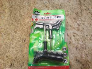 lot 29 image: Slime Deluxe Tire Plug Kit