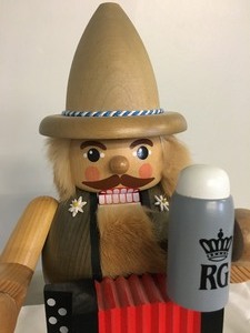 lot 95 image: Erzgebirgische Volkskunst Nutcracker with Accordion and a Beer Mug