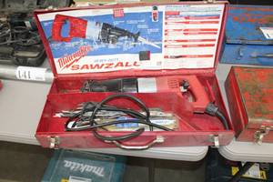 lot 137 image: Milwaukee Sawzall, Blades, Metal Case