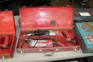 lot 138 image: Milwaukee Sawzall, Blades, Metal Case
