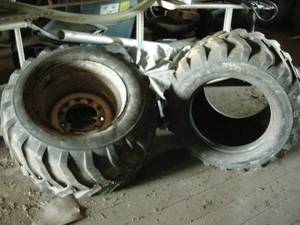 lot 239 image: Pair Heavy Duty Tires and 1 Rim