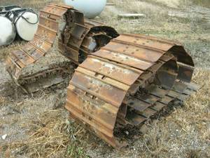 lot 12 image: Tracks for 550 John Deere Dozer