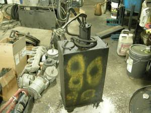 lot 75 image: Rolling OilFluid Dispenser