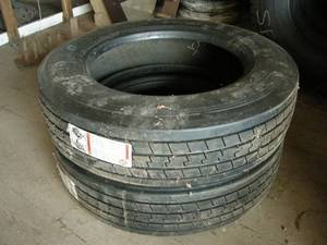lot 234 image: 2 ReCapped 225 TruckTrailer Tires
