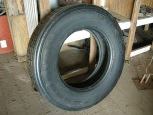 lot 235 image: 1 ReCapped 225 TruckTrailer Tire