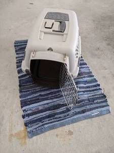 lot 424 image: Pet cage and rug