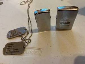 lot 50 image: Pair of Zippo Lighters and Dog Tags