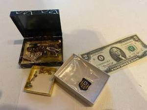 lot 54 image: Military Cufflinks, a Pin, and Two Bucks