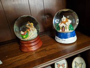 lot 132 image: Two relatively modern Snow Globes