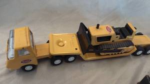 Tonka trucks and dozers. Small toys