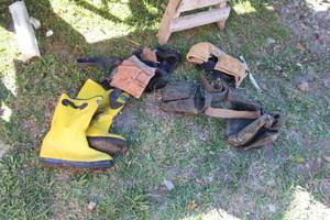 lot 560 image: Tool Belts, Mud Boots Size 13
