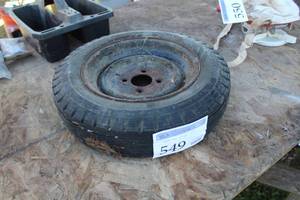 lot 549 image: 4.804.00-12 Jet Rib Spare Tire 13 with 4-Lug 13 Steel Wheel