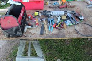 lot 606 image: Husky Soft Side Tool Caddy, Hammer, Drill, Pliers, Cutters, Screwdrivers, and more