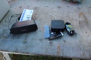 lot 645 image: Apple TV, Remote Control, Memorex Universal Wireless Speaker