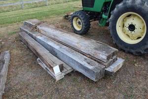 lot 738 image: Lot of (5) Rough-Cut Lumber Planks (x3), Rough-Cut Lumber Beams (x2)