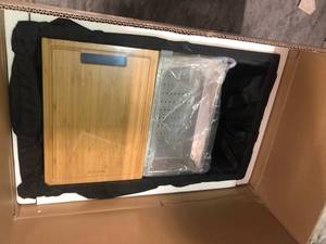 lot 108 image: Glacier Bay All-in-One Undermount Stainless Steel 30 in. Single Bowl Kitchen Workstation Sink with Accessories Kit not used
