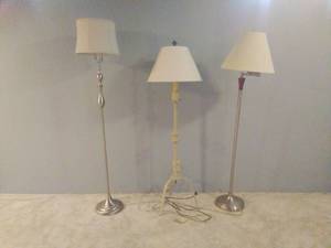 lot 64 image: Three Standing Lamps