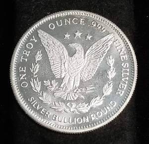 lot 47 image: 1 TROY OZ. .999 FINE SILVER MORGAN DOLLAR DESIGN