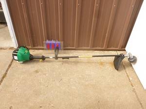 Weed eater 2 cycle trimmer. Nearly new. Tested & works. As shown.