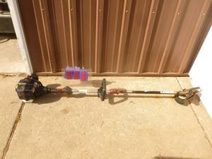 Craftsman 2 cycle brush cutter. Motor unit is new. Cutter is lightly used. Tested & works. As shown.