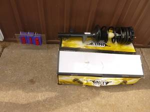Qty of 2 Unity strut assemly. New in box. 94-07 Ford Tauras. As shown.
