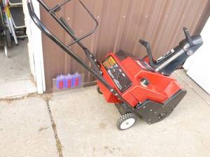 Toro 2 cycle snow blower. 4 hp. Starts & runs. Will need choke rod reattached. As shown.