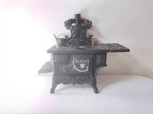 lot 136 image: Crescent Cast Iron Stove