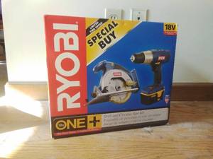 lot 143 image: Ryobi Drill and Circular Saw Kit
