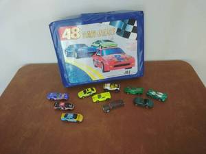 lot 60 image: Ten Matchbox Cars with Case
