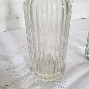 lot 46 image: Vintage Pair of Setlzer Soda Bottles