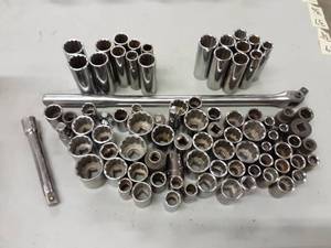lot 26 image: Large Assortment  Of 12 Drive Sockets, Extensions, Breaker Bar SAEMetric