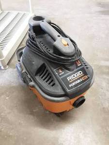 lot 54 image: Ridgid 5 HP 4 Gallon Shop Vac. ( No Hose)