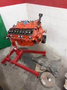 lot 60 image: Stock 327 Motor & Transmission From 1967 Camaro (Seller States Good Condition) Includes New Engine Stand.