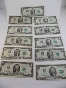 lot 82 image: 11 - $2 Green Seal Bills